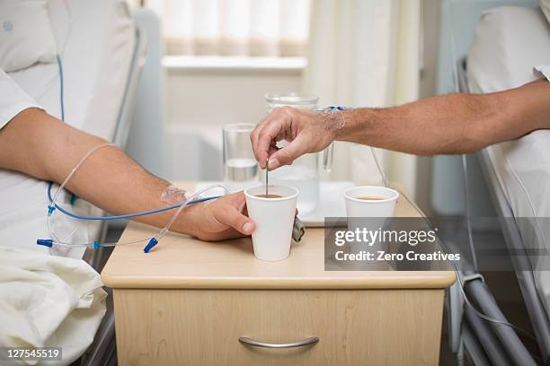 patients having coffee in hospital beds - side table stock pictures, royalty-free photos & images