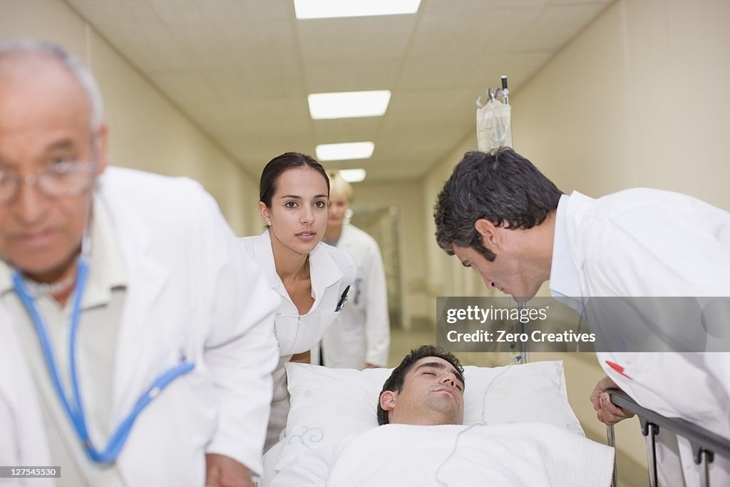 Doctor Rushing Patient In Doctors Rushing Patient Down Hallway High-Res Stock Photo - Getty Images