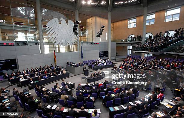 Ministers attend a session in the lower-house of the German Parliament, ahead of a vote to expanded the powers of the European Financial Stability...