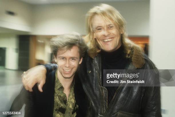 Singers Phil Solem of The Rembrandts and Brian Howe of Bad Company pose for a portrait at Roy Wilkins Auditorium in St. Paul, Minnesota on November...