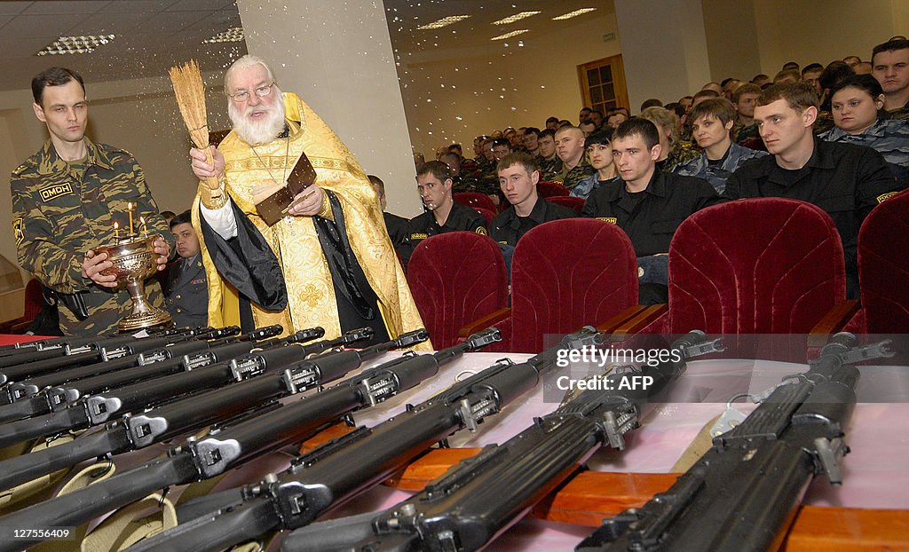 A Russian Orthodox priest blesses new Ka