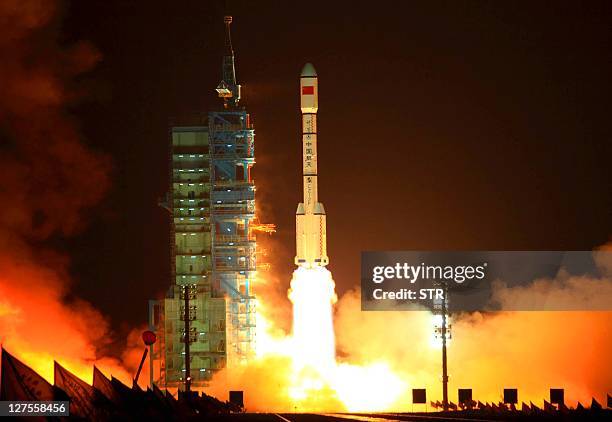 China's Long March 2F rocket carrying the Tiangong-1 module, or "Heavenly Palace", blasts off from the Jiuquan launch centre in Gansu province on...