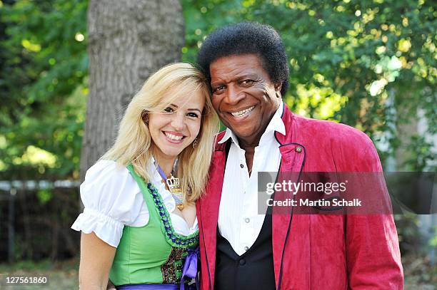 Singer Roberto Blanco and Luzandra Strassburg attend the "Wiener Wiesn" - Vienna Oktoberfest on September 29, 2011 in Vienna, Austria.