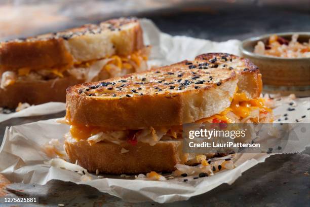 spicy korean kimchi grilled cheese sandwich's - grilled cheese stock pictures, royalty-free photos & images