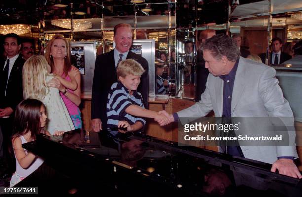 Kathie Lee Gifford, with husband Frank, son Cody, daughter Cassidy, and Regis Philbin at Kathie's retirement/goodbye party at Tavern On the Green in...