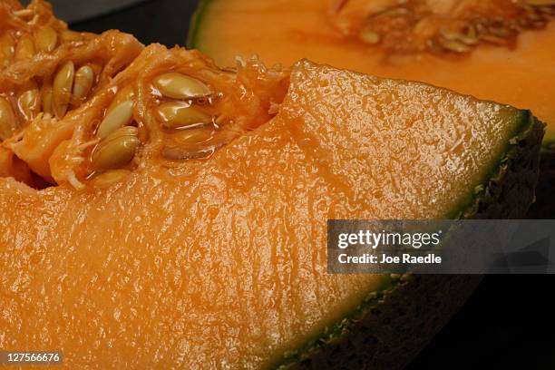 In this photo illustration a cantaloupe is seen sliced open on September 29, 2011 in Miami, Florida. The Centers for Disease Control and Prevention...