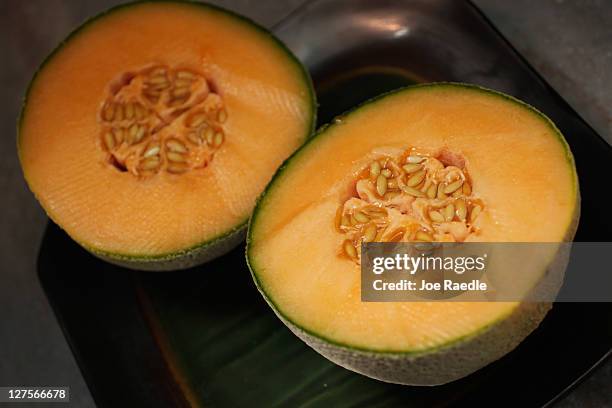 In this photo illustration a cantaloupe is seen sliced open on September 29, 2011 in Miami, Florida. The Centers for Disease Control and Prevention...