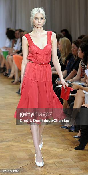 Model walks the runway during the Nina Ricci Ready to Wear Spring / Summer 2012 show during Paris Fashion Week on September 29, 2011 in Paris, France.