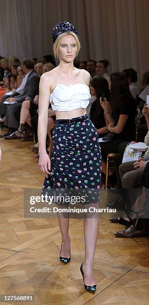 Model walks the runway during the Nina Ricci Ready to Wear Spring / Summer 2012 show during Paris Fashion Week on September 29, 2011 in Paris, France.