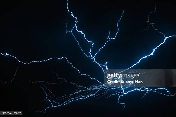 lightning in the night sky - lightening storm stock pictures, royalty-free photos & images
