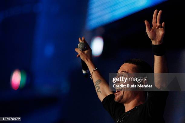 Singer Dinho performs on stage during a concert in the Rock in Rio Festival on September 29, 2011 in Rio de Janeiro, Brazil. Rock in Rio Festival...