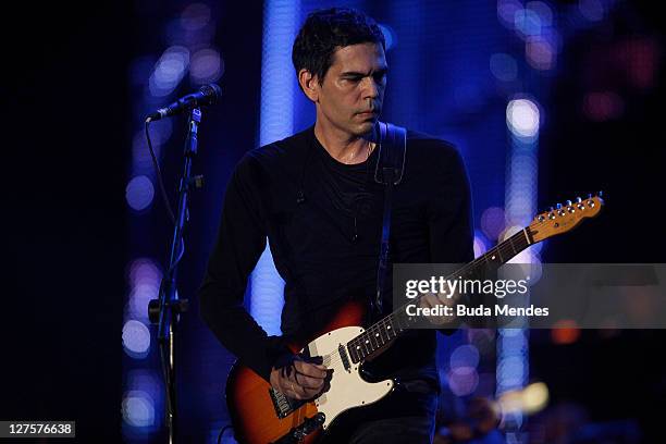 Guitarist Dado Villa Lobos performs on stage during a concert in the Rock in Rio Festival on September 29, 2011 in Rio de Janeiro, Brazil. Rock in...