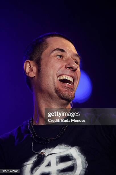 Singer Dinho performs on stage during a concert in the Rock in Rio Festival on September 29, 2011 in Rio de Janeiro, Brazil. Rock in Rio Festival...