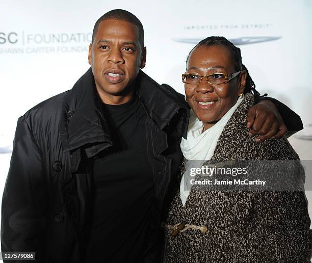 Jay-Z poses with his mother, Gloria Carter during an evening of "Making The Ordinary Extraordinary" hosted by The Shawn Carter Foundation at Pier 54...