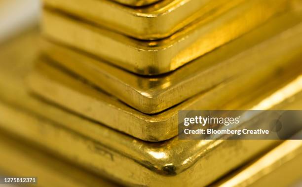 gold ingots - gold investment stock pictures, royalty-free photos & images