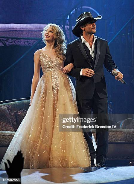 Taylor Swift and Tim McGraw perform at the Bridgestone Arena on September 17, 2011 in Nashville, Tennessee.