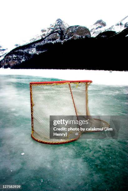 pond hockey on a big rink - pond hockey stock pictures, royalty-free photos & images