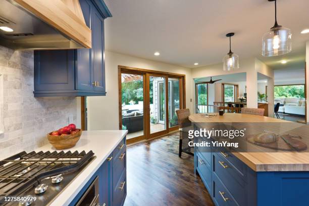 hem förbättring remodeled contemporary open concept kitchen design - sliding door bildbanksfoton och bilder