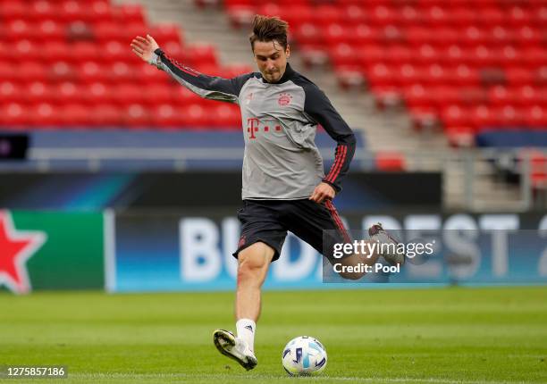 Adrian Fein of Bayern Munich takes part in a training session ahead of their UEFA Super Cup match against Sevilla at Stadium Puskas Ferenc on...