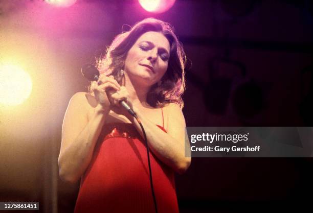 American folk and pop artist Judy Collins performs onstage during the Dr. Pepper Concert Series at Central Park, New York, New York, July 7, 1979.