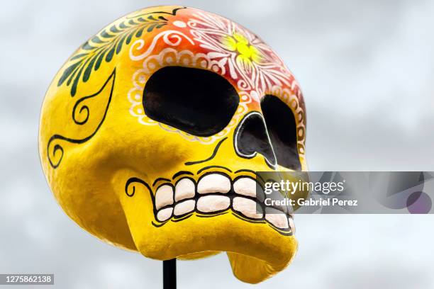 a papier-mâché skull from mexico - mexican skull stock pictures, royalty-free photos & images