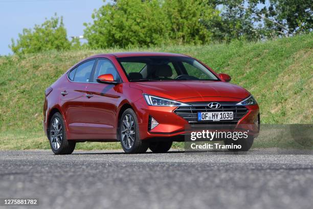 hyundai elantra on a street - hyundai elantra stock pictures, royalty-free photos & images