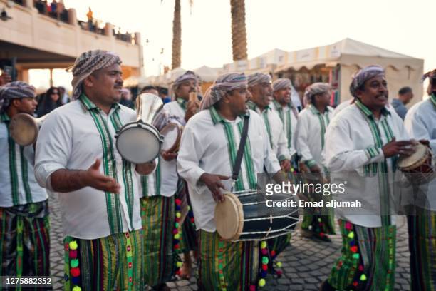 traditional band plays at marina crescent in salmiya, kuwait city, kuwait - kuwait tradition stock pictures, royalty-free photos & images