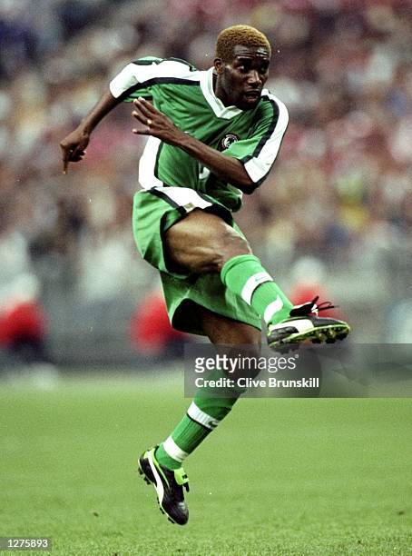Jay Jay Austine Okocha of Nigeria in action during the World Cup second round match against Denmark at the Stade de France in St Denis, France....