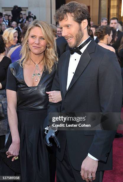 Jessica Trusty and Aron Ralston arrive at the 83rd Annual Academy Awards held at the Kodak Theatre on February 27, 2011 in Los Angeles, California.