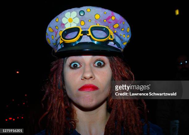 Linda Perry, lead singer of "4 Non Blondes", makes a funny face in colorful makeup and hat on her way in to tape The Late Show With David Letterman...