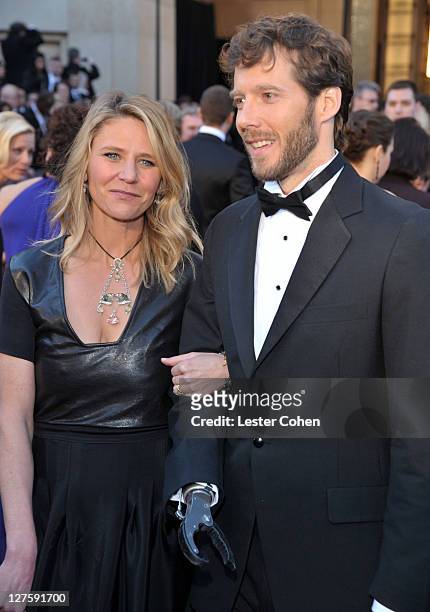 Jessica Trusty and Aron Ralston arrive at the 83rd Annual Academy Awards held at the Kodak Theatre on February 27, 2011 in Los Angeles, California.