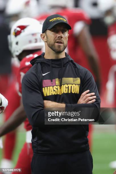Quarterback Alex Smith of the Washington Football Team before the NFL game against the Arizona Cardinals at State Farm Stadium on September 20, 2020...