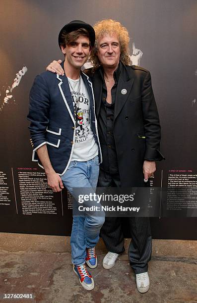 Mika and Queen's Brian May attend the Private View of Queen: Stormtroopers In Stilettos on February 24, 2011 in London, England.