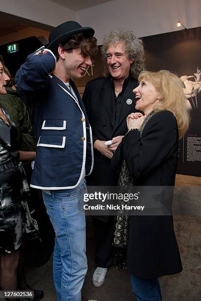 Mika, Brian May and Anita Dobson attend the Private View of Queen: Stormtroopers In Stilettos on February 24, 2011 in London, England.