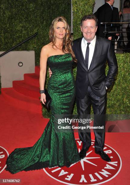 Personality Piers Morgan and Celia Walden arrive at the Vanity Fair Oscar party hosted by Graydon Carter held at Sunset Tower on February 27, 2011 in...