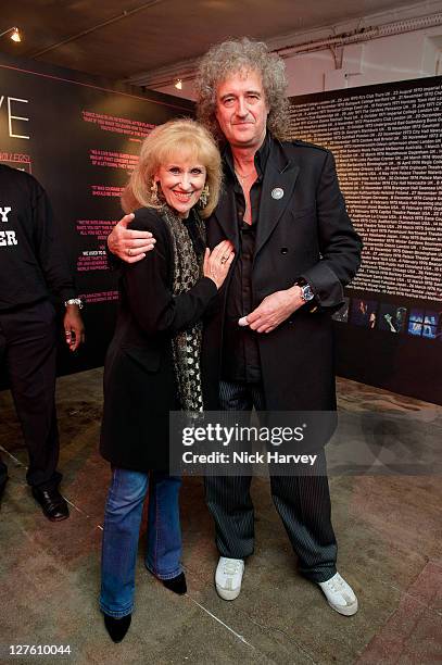 Anita Dobson and Queen's Brian May attend the Private View of Queen: Stormtroopers In Stilettos on February 24, 2011 in London, England.