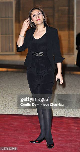 French State Secretary to the Minister of Labour, Employment and Health Nora Berra poses as she arrives to the State Dinner At Elysee Palace...
