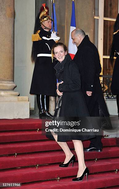 French Minister Ecology, Sustainable Developement, Transportation and Housing Nathalie Kosciusko-Morizet and her husband pose as they arrive to the...