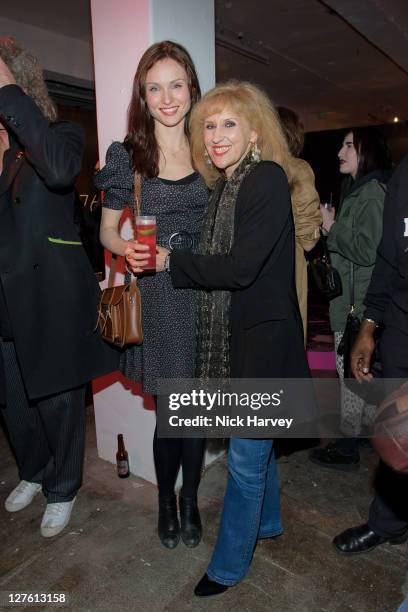 Sophie Ellis-Bextor and Anita Dobson attend the Private View of Queen: Stormtroopers In Stilettos on February 24, 2011 in London, England.