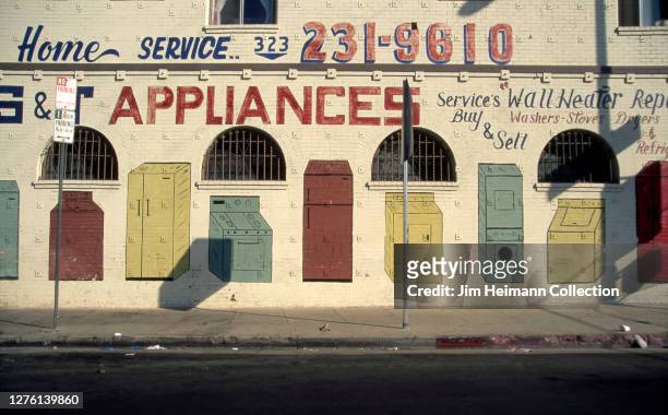 Appliances in Los Angeles, California has various home appliances painted across its facade, 1995.
