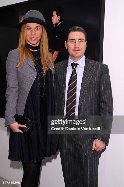 Ania Golezinowska and Paolo Enrico Beretta attend the Opening Cardi Black Box Gallery during the Milan Fashion Week Womenswear Autumn/Winter 2011 on...