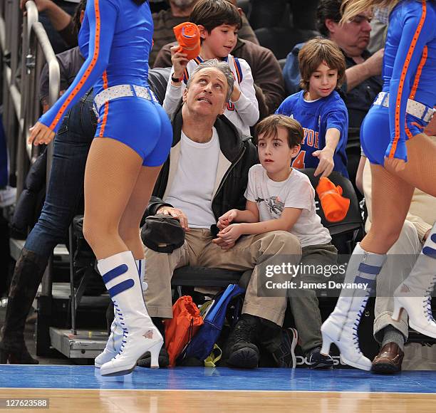 Jon Stewart and son Nathan Thomas Stewart attend the Cleveland Cavaliers vs New York Knicks game at Madison Square Garden on March 4, 2011 in New...