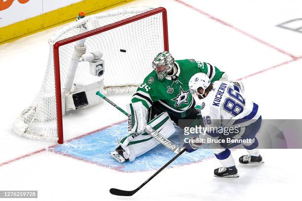 Nikita Kucherov of the Tampa Bay Lightning scores a goal past Anton Khudobin of the Dallas Stars during the first period in Game Three of the 2020...