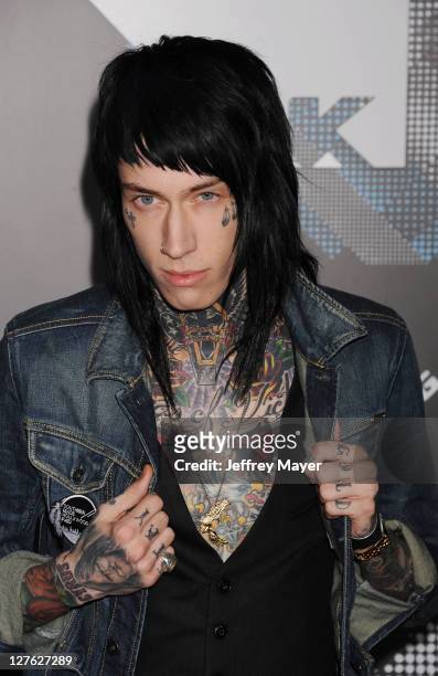 Trace Cyrus arrives for the T-Mobile Sidekick 4G launch celebration in a Private Lot on April 20, 2011 in Beverly Hills, California.