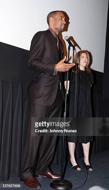 Executive Producer and NBA Player Grant Hill and producer/director Amy Unell speak during the premiere of "Starting at the Finish Line: The Coach...