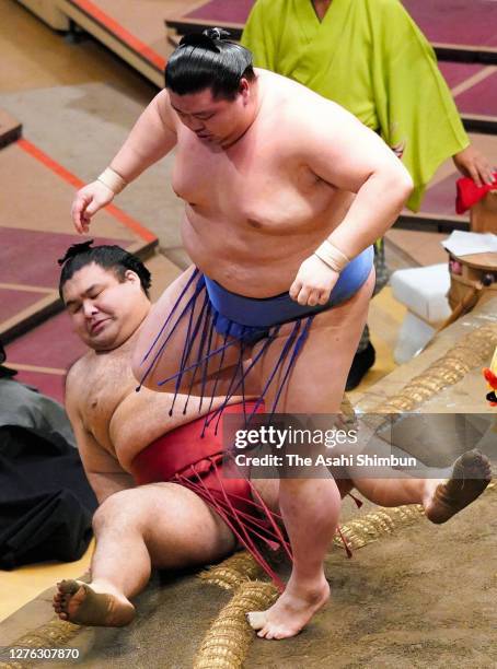 Sekiwake Shodai pushes Takayasu out of the ring to win on day eleven of the Grand Sumo Autumn Tournament at Ryogoku Kokugikan on September 23, 2020...