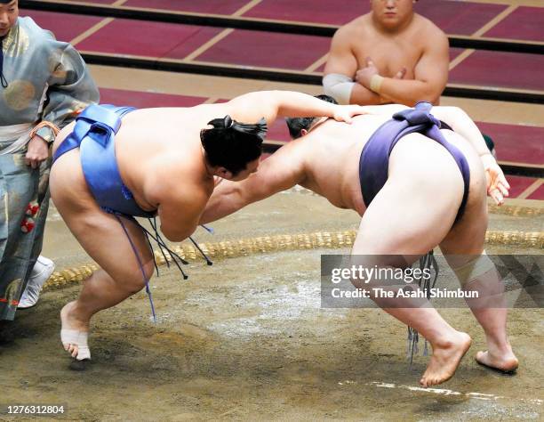 Tobizaru throws Onosho to win on day eleven of the Grand Sumo Autumn Tournament at Ryogoku Kokugikan on September 23, 2020 in Tokyo, Japan.