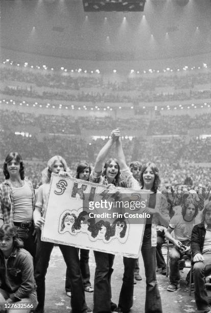 Fans of American hard rock band KISS at a concert by the band in Detroit, Michigan, May 1975.