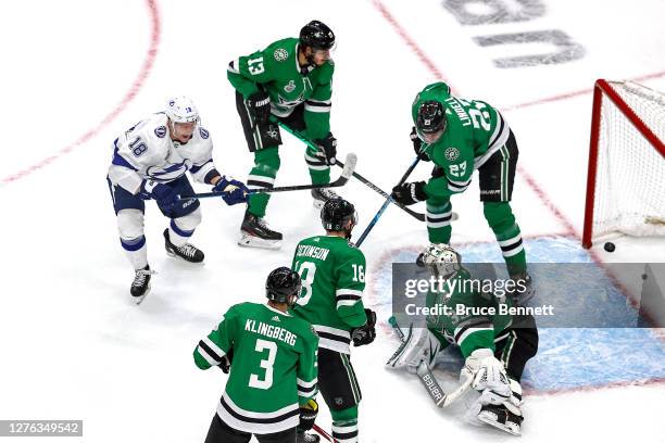 Ondrej Palat of the Tampa Bay Lightning scores a goal past Anton Khudobin of the Dallas Stars during the second period in Game Three of the 2020 NHL...