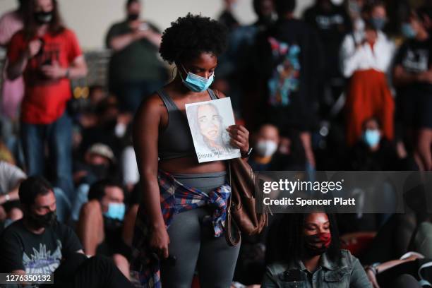 Members of Black Lives Matters are joined by hundreds of others during an evening protest against the Kentucky grand jury decision in the Breonna...